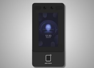 A wall-mounted Hikvision device with a camera and screen for facial recognition access control.
